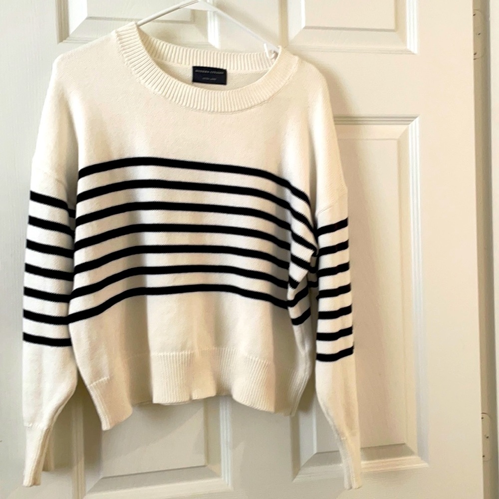 White crew neck with black stripes